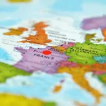 A map of Europe with a red marker indicating the location of France.