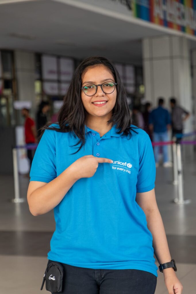 Pari Patel in a blue shirt unicef shirt