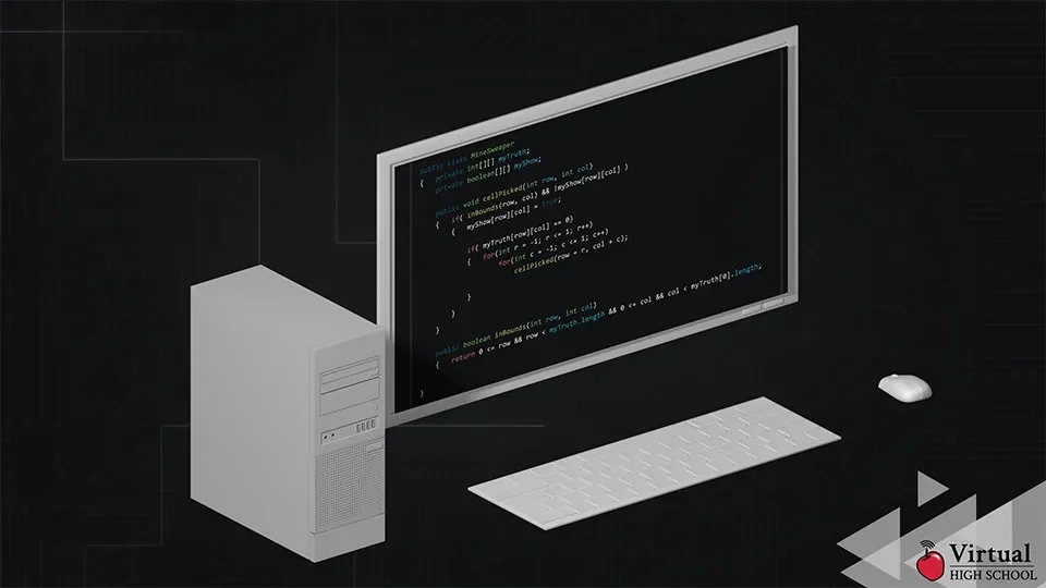 A desktop computer with html code on the monitor