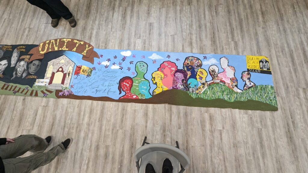 A detail shot on the right side of the mural highlighting Black history and excellence.
