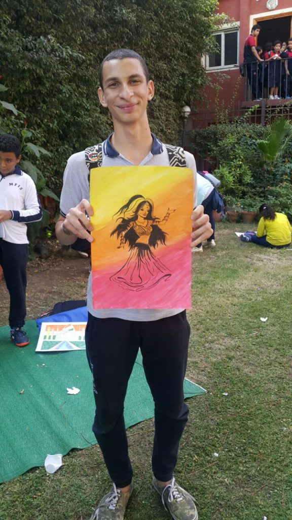 Ahmed Elgendy serves food to people in need and plays games with children from a local orphanage to help his community.